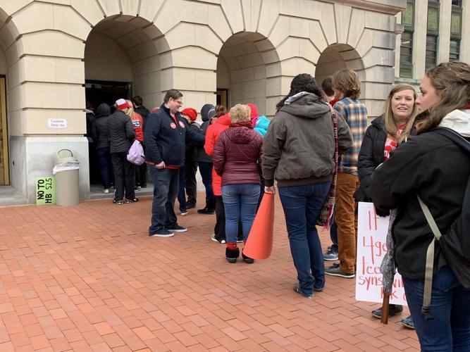 Teachers Carrying Signs.jpg