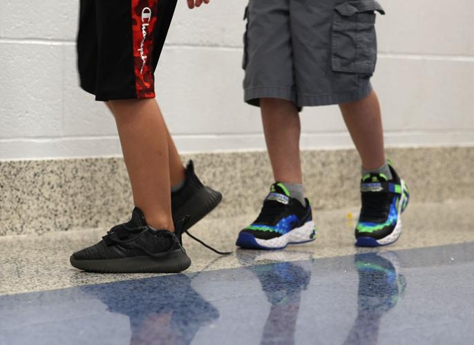 Students walk down the hallway of Shepherdsville Elementary