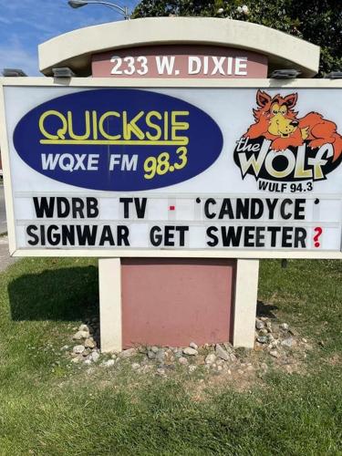 Quicksie sign war 6-7-22 (2).jpg