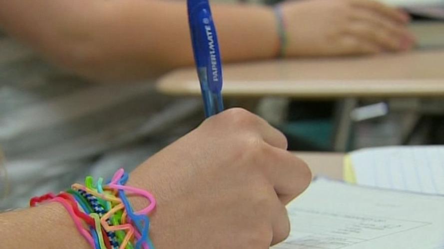 NORTH LAWRENCE SCHOOLS CLOSING 10PKG.transfer_frame_2621 hand.jpg