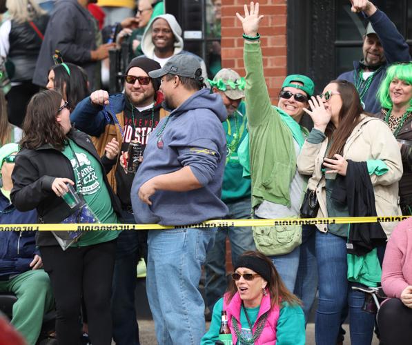 Crowd waves during parade