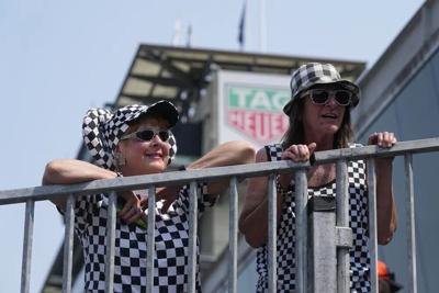 Fans watch during practice at Indianapolis Motor Speedway - AP FILE.jpg