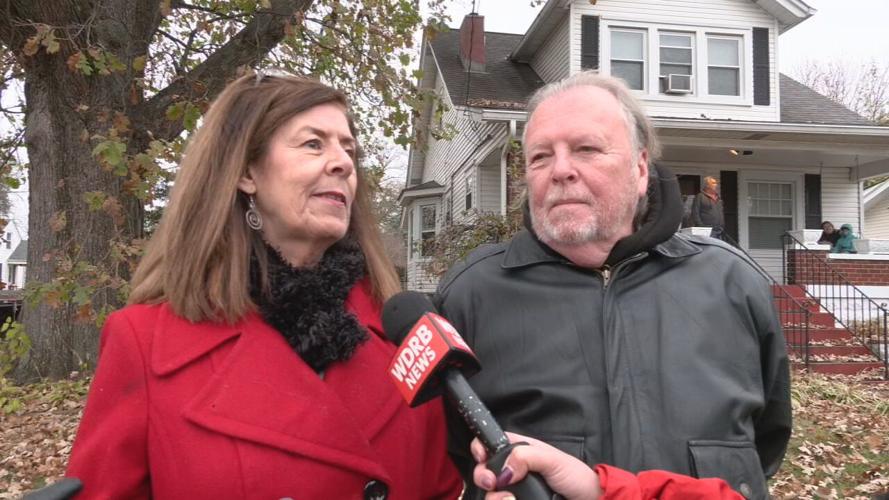 Greg and Karen Kaelin stand before the future 2022 Light Up Louisville Christmas tree
