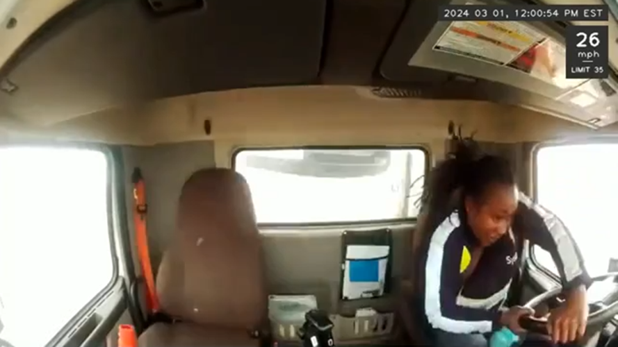 Dashcam image showing Sydney Thomas in Sysco semi cab