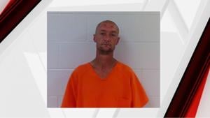 New Albany man arrested after allegedly waving sharp object at officers