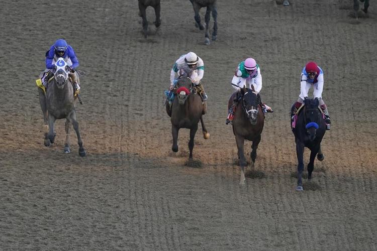 John Velazquez rides Medina Spirit to win the 147th running of the Kentucky Derby