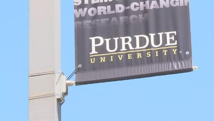 Purdue University cuts working spouses from health care plan