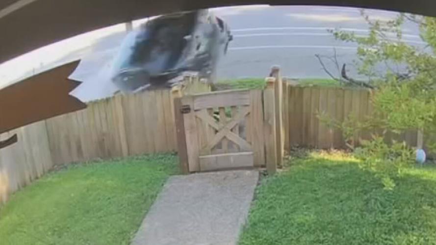 Home security camera footage of airborne car crashing into tree April 2025