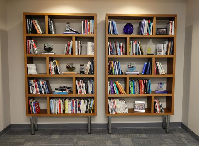 Book shelf at Confluent Health headquarters
