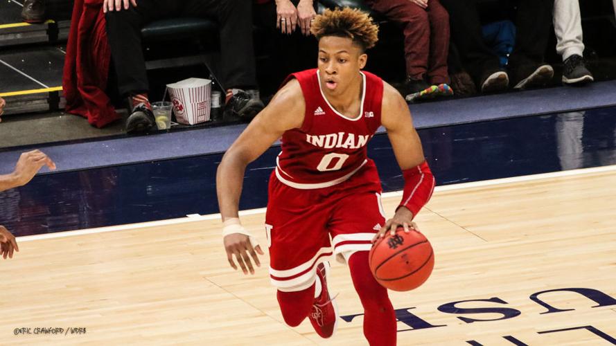 Romeo Langford dribbles