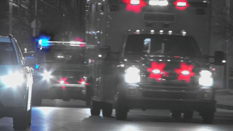 Ambulance followed by police car