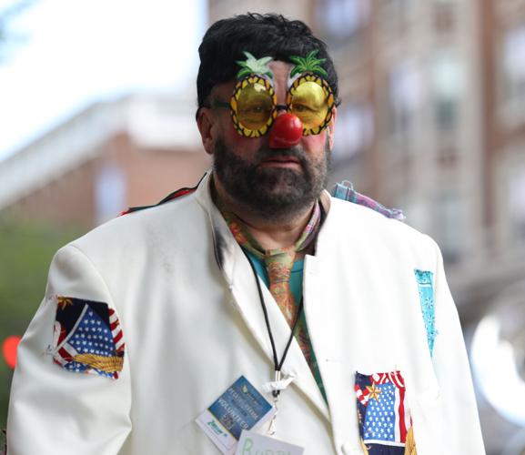 Clown man walks at parade.JPG