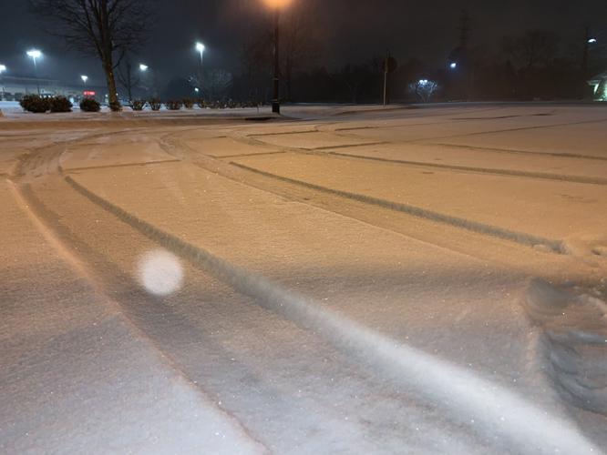 Snow in parking lot in Middletown