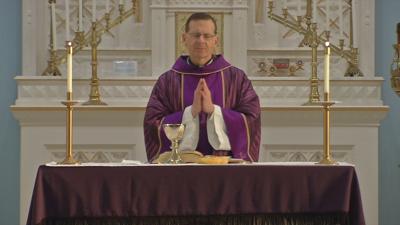 Priest runs marathon