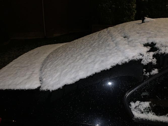 Snow on car in Louiville.JPG