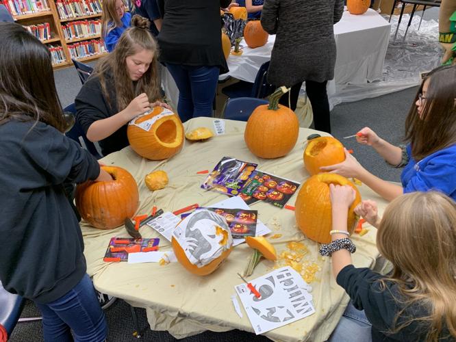 Jack O Lantern Stroll - More students carve.jpeg
