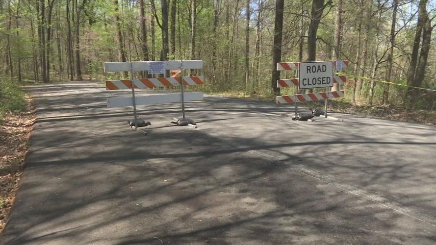 Road closed sign at Louisville park due to COVID-19