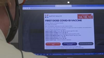 Dr. Fred Johnson, 70, searches for a COVID-19 vaccination appointment