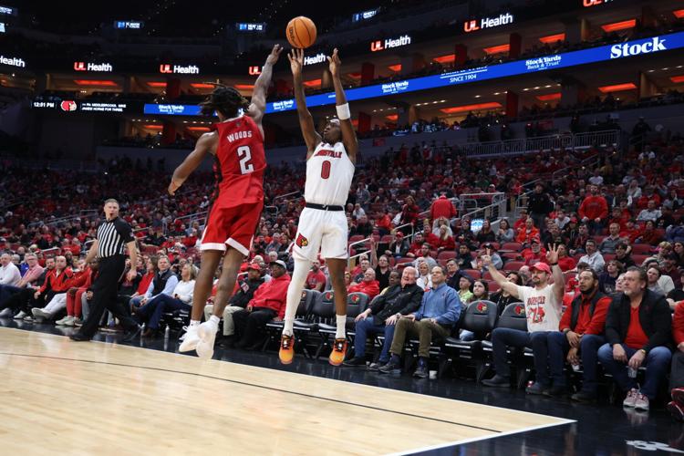 Mike James takes a shot against NC State.JPG