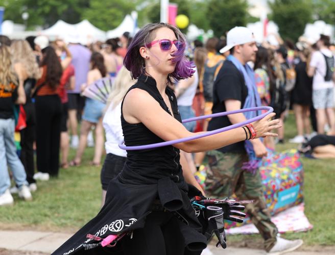 A woman hula hoops at Forecastle.JPG