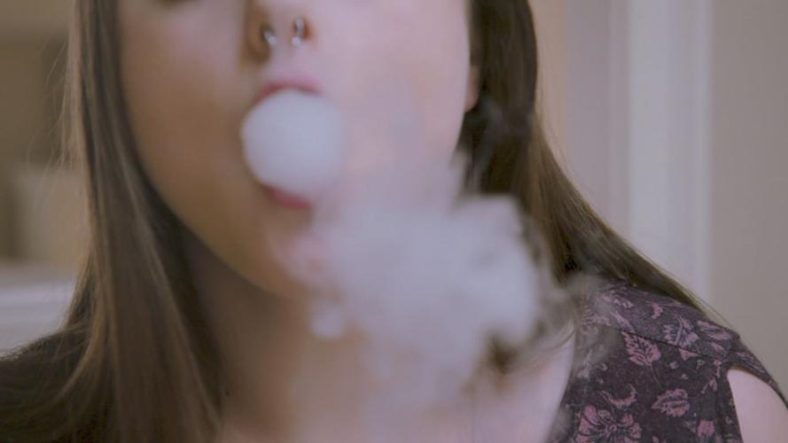 Woman vaping (generic)