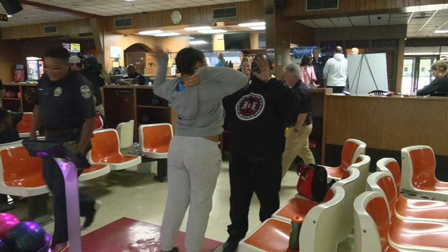 JCPS families take advantage of free bowling at Executive Strike and ...