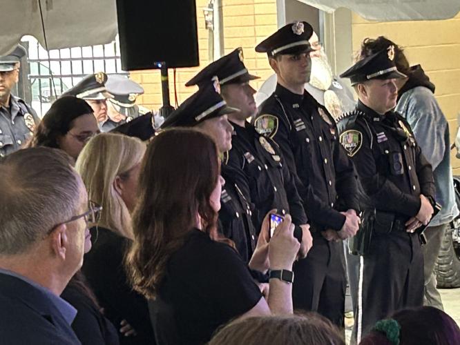 New Albany police officers at ribbon-cutting