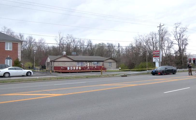 Crime tape outside Onion Restaurant in New Albany
