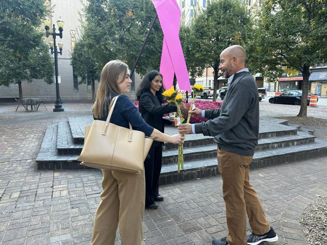Local florist pays it forward by giving sunflowers away for free