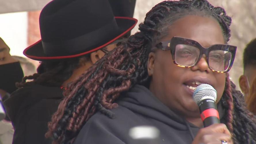 Poet Hannah Drake speaks during a rally