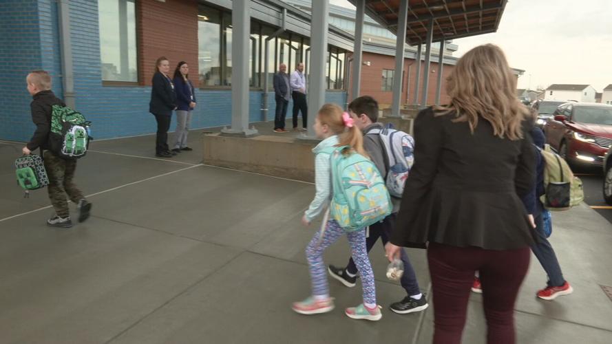 Students enter Old Mill Elementary School