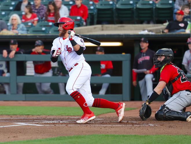 Bats player hits a pitch.JPG