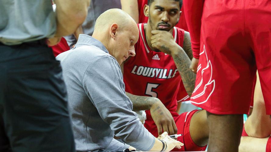 Chris Mack in huddle