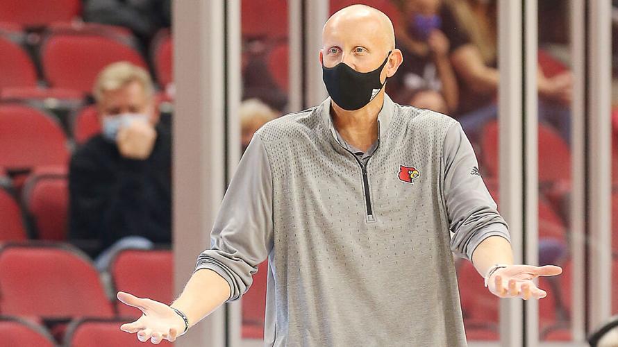 Chris Mack with arms out