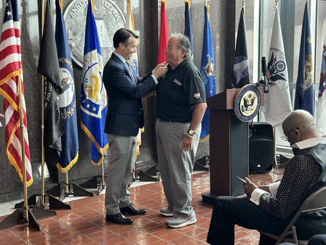 Morgan McGarvey pins Vietnam Veterans - 11.7.24