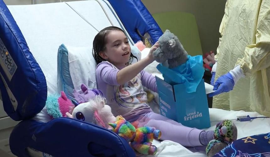 A Norton Healthcare child patient receives a Valentine's Day gift in 2022
