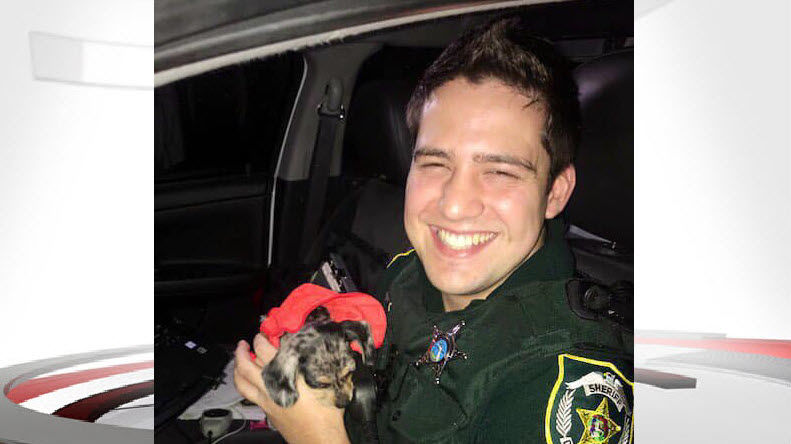 Hurricane Dorian Puppy Orange County Sheriff Deputy with