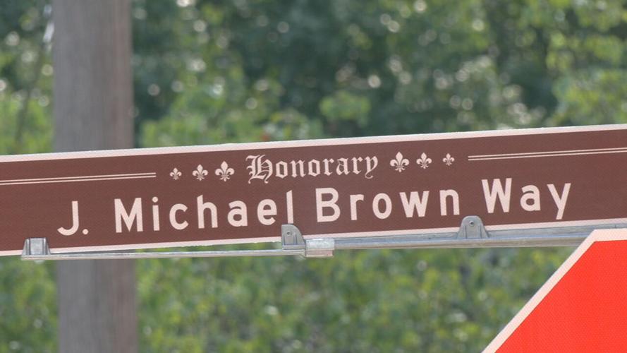 J. Michael Brown Way honorary street sign