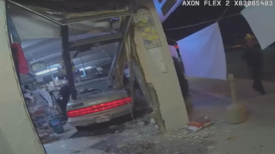 Louisville looting car driven into store.jpg