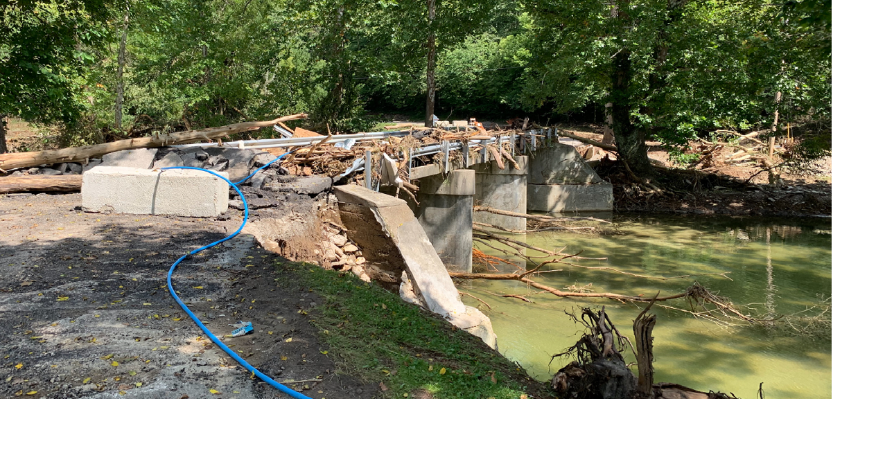 Manville flooding washed out bridge