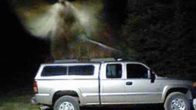 Michigan man claims security camera captured an 'angel' floating over truck