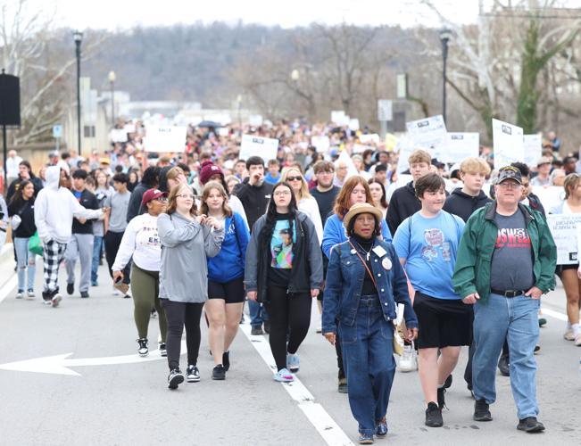 Marchers walk toward Capitol during walk.JPG
