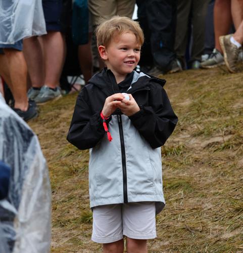 Boy receives a golf ball at Valhalla.JPG