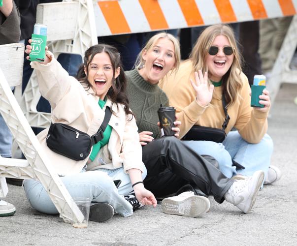 Girls pose for photo at parade