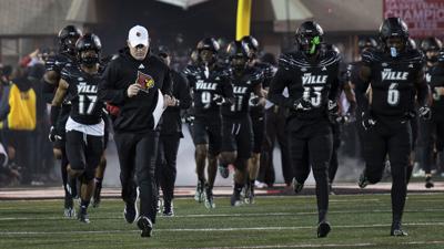 Brohm runs onto field