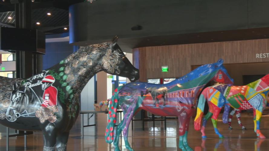 Rows of Gallopalooza horses at Churchill Downs First Turn Club