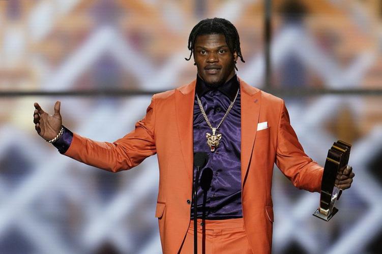 Baltimore Ravens' Lamar Jackson speaks after winning the AP Most Valuable Player award