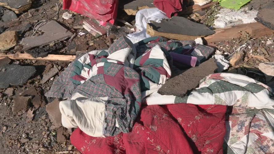 Debris on ground after tornado in Mayfield, Ky.