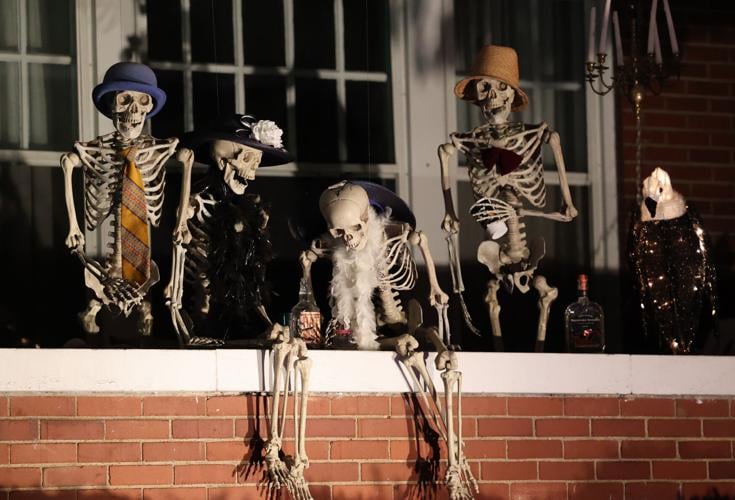 Skeletons on front porch of Hillcrest.JPG