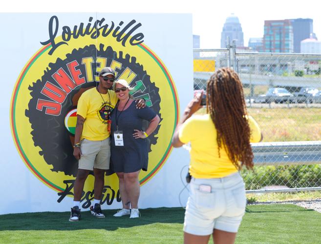 Aaron Jordan takes a photo at Louisville Juneteenth Festival.JPG